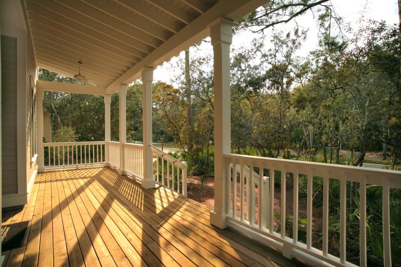 How A Freestanding Porch Installation Enhances Backyard Functionality